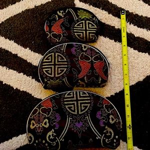 Three cosmetic/jewelry cases